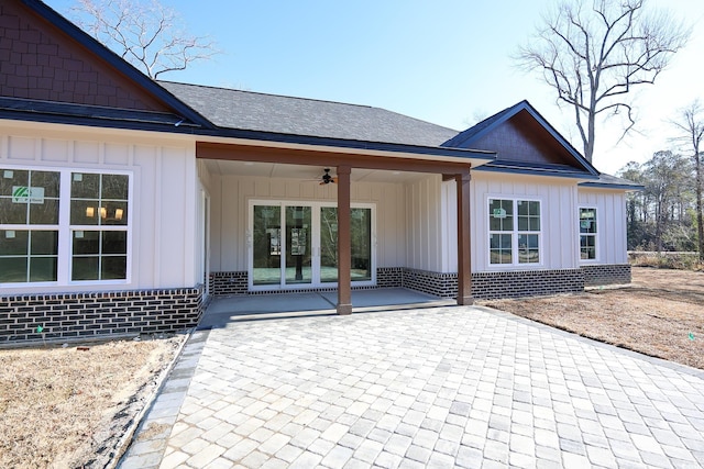 back of house featuring ceiling fan and a patio area