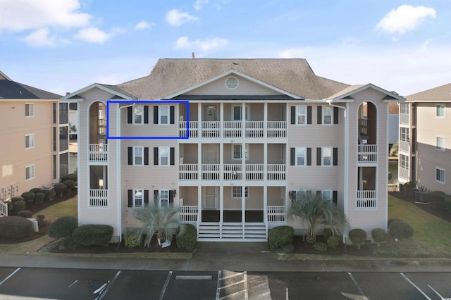 1900 Duffy St Unit C-7, North Myrtle Beach, SC 29582 - view of property featuring uncovered parking