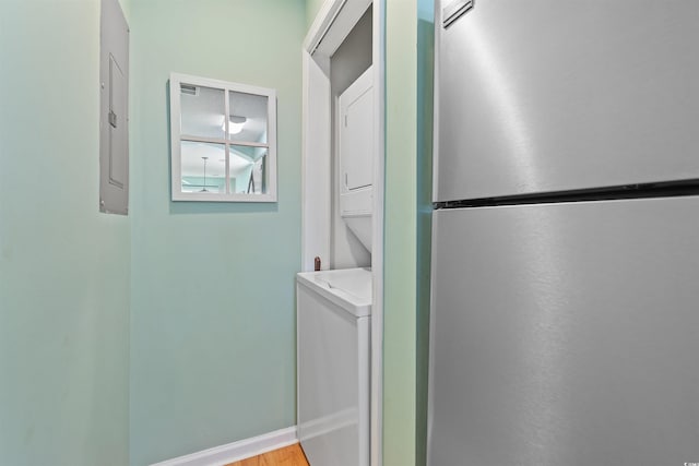 1900 Duffy St Unit C-7, North Myrtle Beach, SC 29582 - laundry area featuring baseboards, laundry area, and stacked washer / dryer