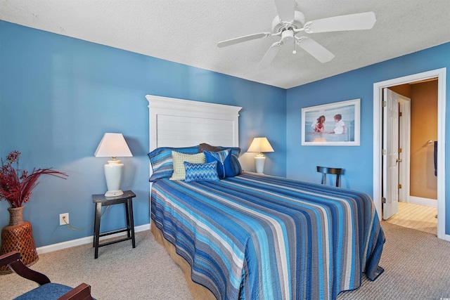 1900 Duffy St Unit C-7, North Myrtle Beach, SC 29582 - bedroom with a textured ceiling, baseboards, ceiling fan, and carpet
