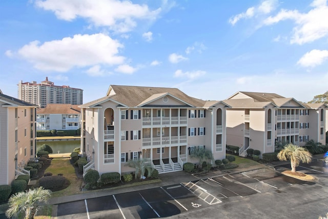 view of building exterior featuring a water view