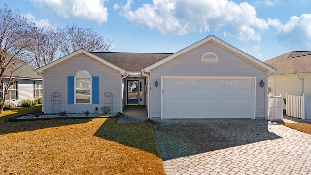 single story home featuring a garage