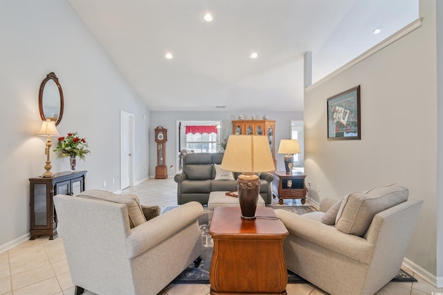 living room featuring high vaulted ceiling and light tile patterned flooring