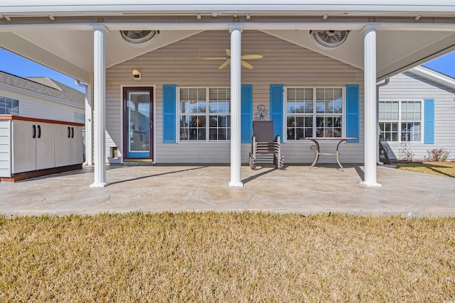 back of house featuring a patio area and ceiling fan