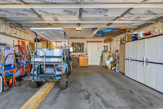 garage featuring a garage door opener