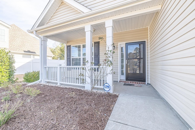 entrance to property with covered porch