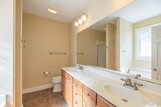 full bathroom with tile patterned flooring, vanity, separate shower and tub, and toilet