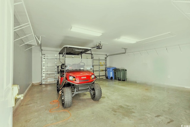 garage featuring a garage door opener