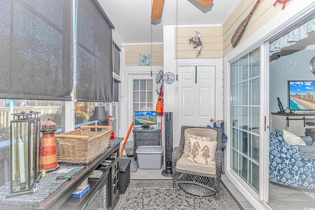 interior space featuring ceiling fan