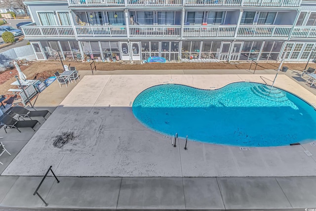 pool featuring a patio area