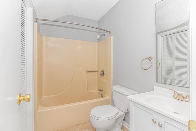 full bath with toilet, bathtub / shower combination, a closet, and vanity