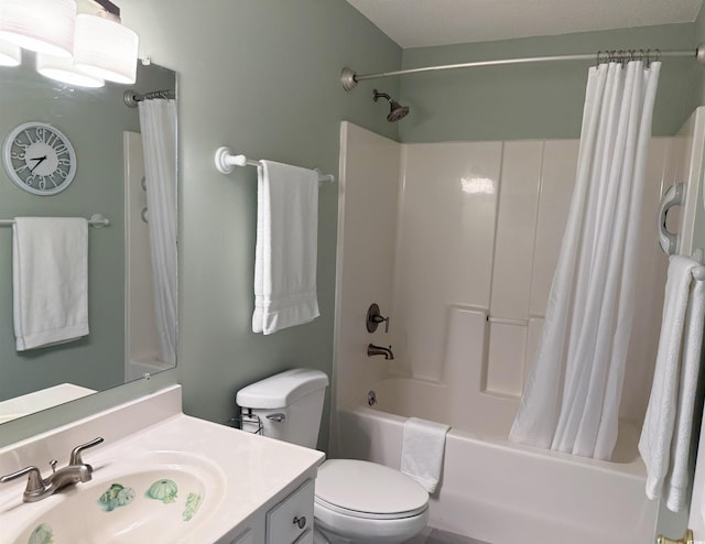 full bathroom featuring vanity, toilet, and shower / tub combo