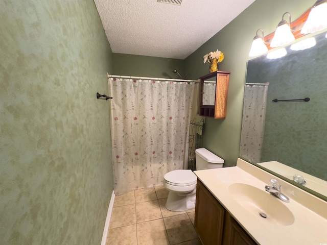 full bathroom featuring tile patterned floors, toilet, shower / tub combo, a textured ceiling, and vanity