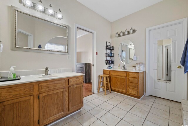 bathroom featuring vanity and tile patterned flooring