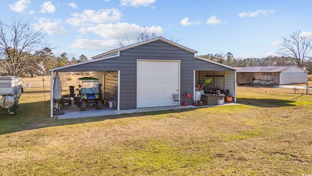 garage with a yard