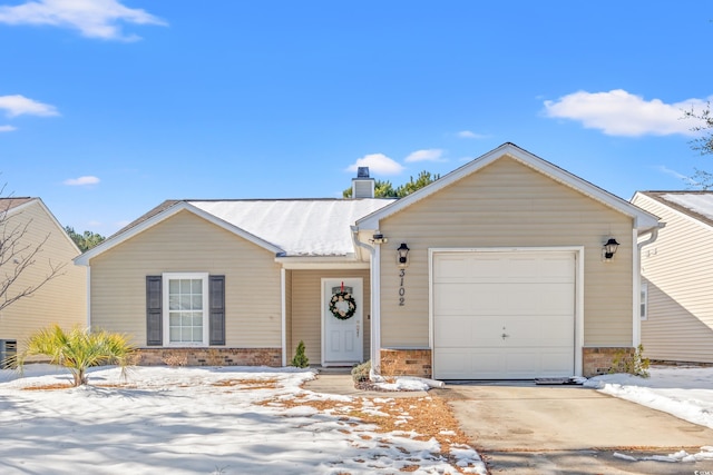 ranch-style home with a garage