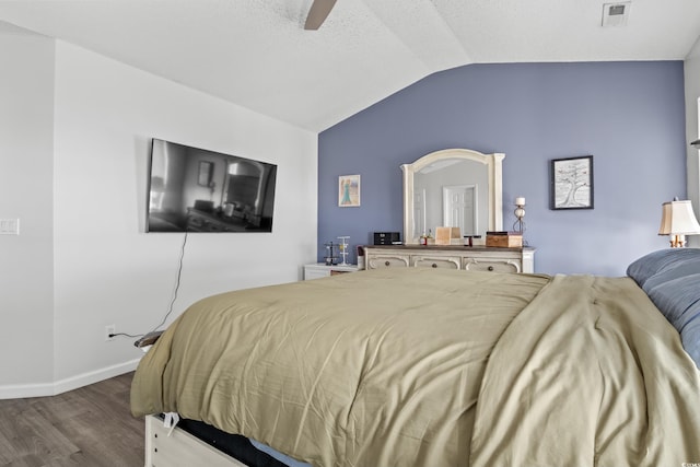 bedroom with lofted ceiling, wood-type flooring, and ceiling fan