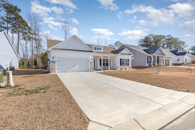 view of front of house with a garage and a front lawn