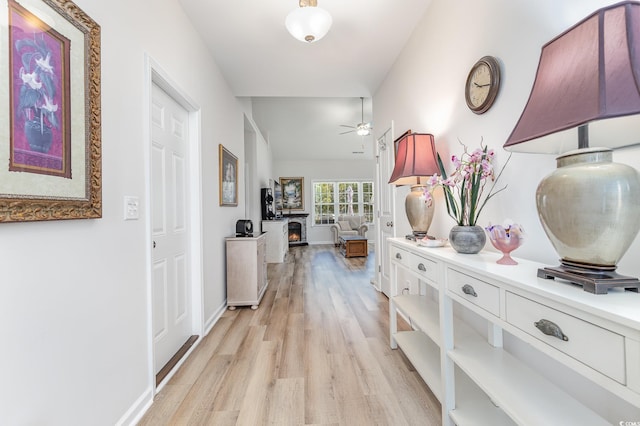 hallway featuring light wood-type flooring