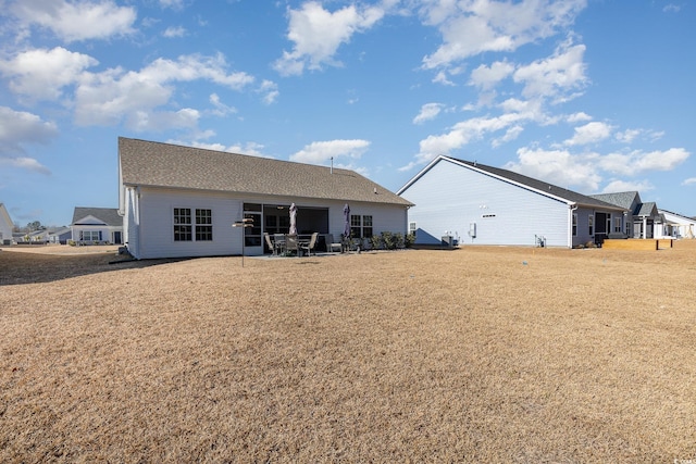 rear view of house featuring a patio