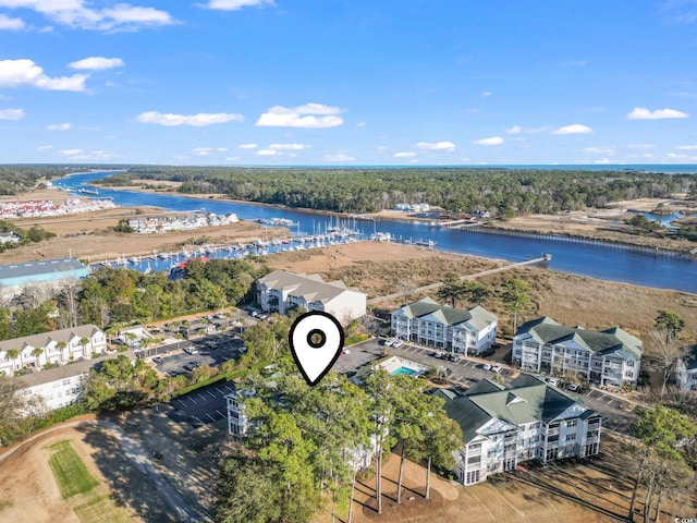 bird's eye view with a water view