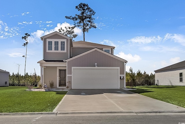 view of front of property with a garage and a front yard