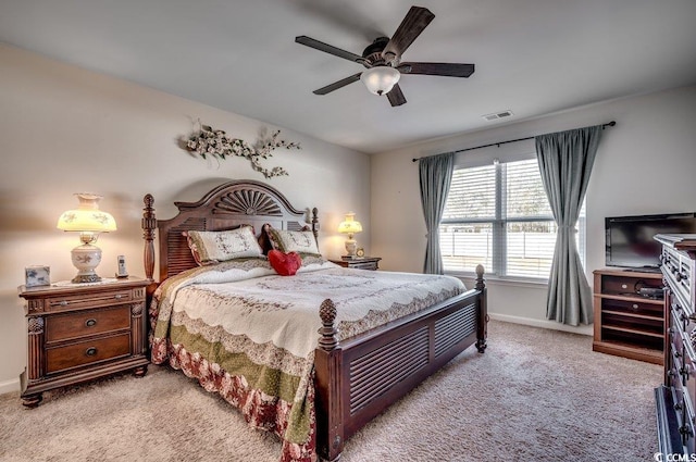 carpeted bedroom featuring ceiling fan