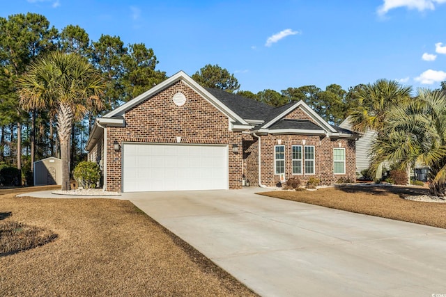 view of front facade with a garage and a front yard