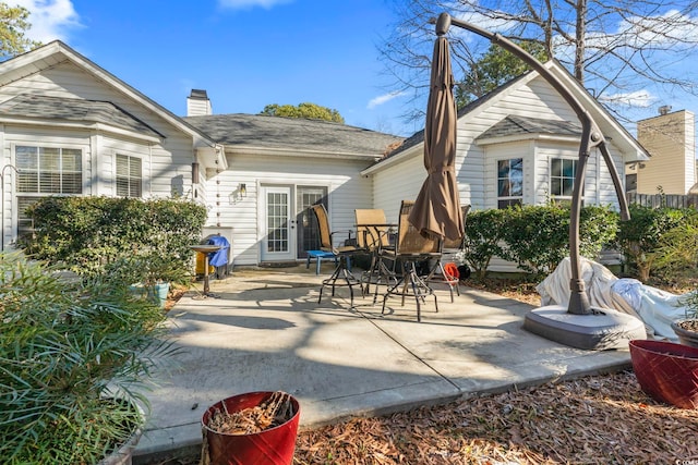 rear view of property with a patio