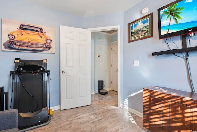 office space with light hardwood / wood-style flooring