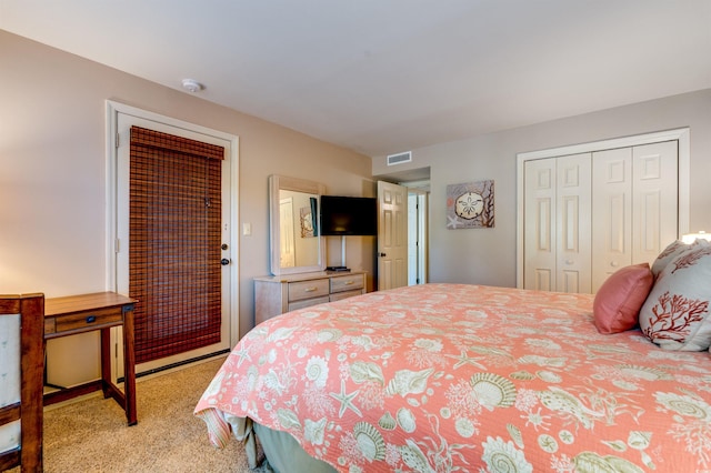 carpeted bedroom featuring a closet
