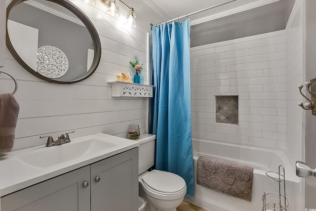 full bathroom with vanity, toilet, and shower / tub combo