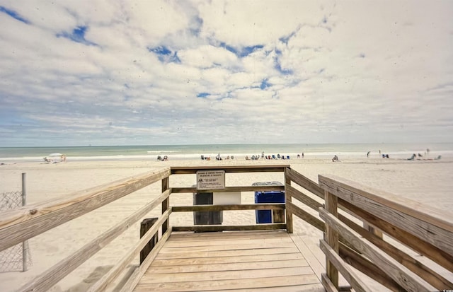 view of community featuring a view of the beach and a water view