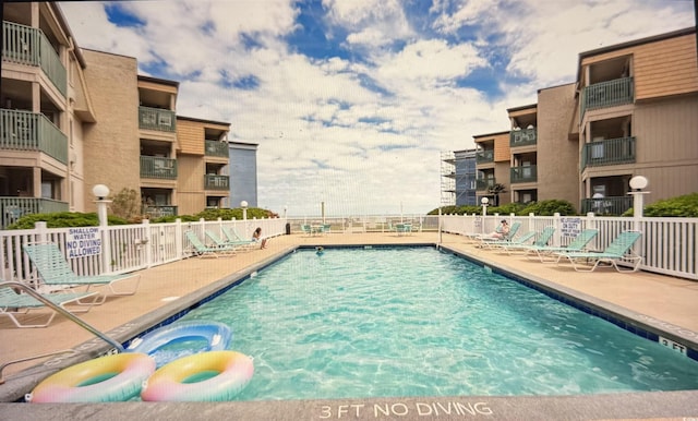 view of pool with a patio