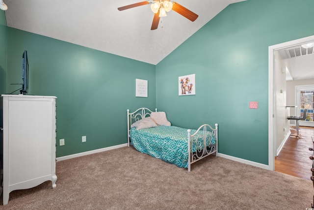 carpeted bedroom featuring visible vents, ceiling fan, baseboards, and lofted ceiling