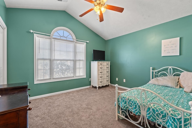 bedroom featuring carpet flooring, multiple windows, baseboards, and lofted ceiling