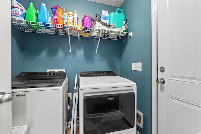 clothes washing area with laundry area and independent washer and dryer