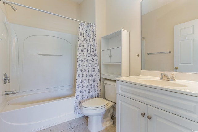 full bathroom with vanity, shower / tub combo with curtain, tile patterned floors, and toilet