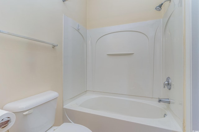 bathroom featuring toilet and shower / bath combination