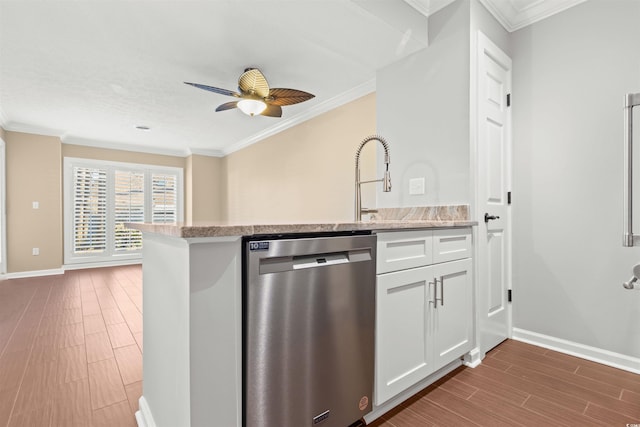 kitchen featuring white cabinetry, dishwasher, crown molding, and kitchen peninsula