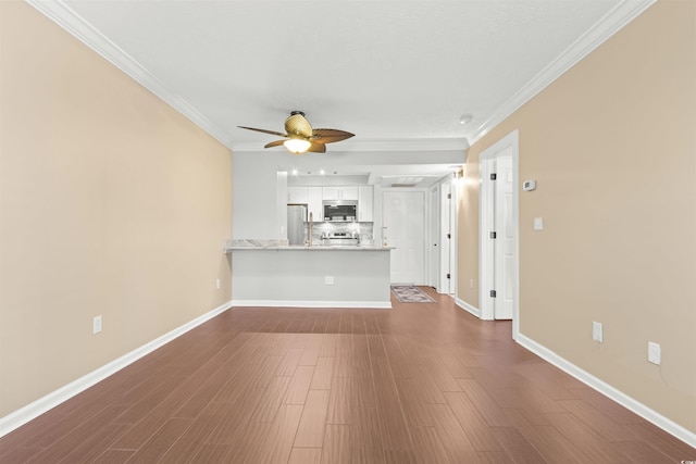 unfurnished living room with crown molding, ceiling fan, and dark hardwood / wood-style flooring