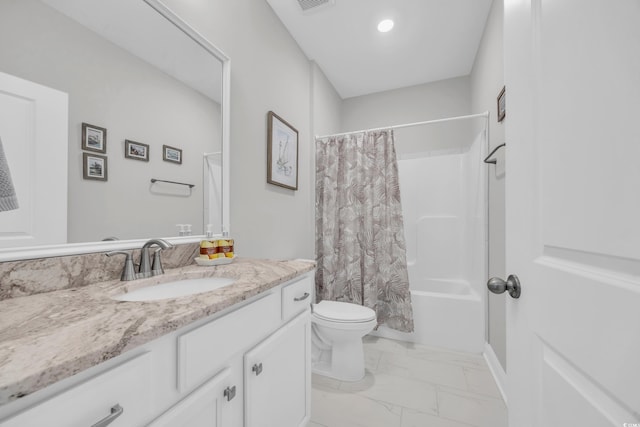 full bathroom with shower / bath combination with curtain, vanity, and toilet