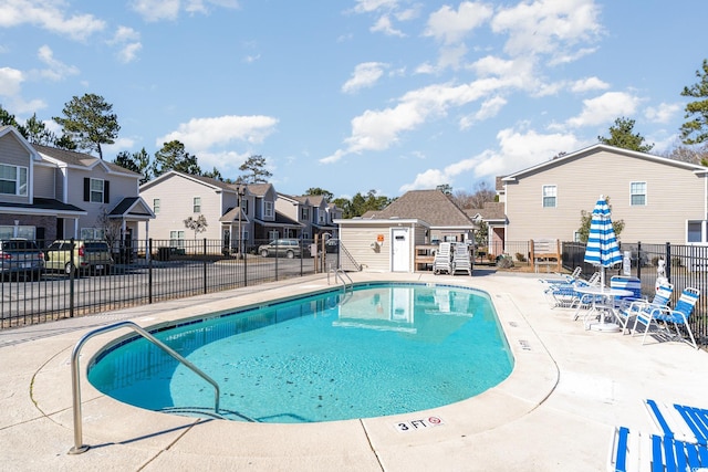 view of pool featuring a patio