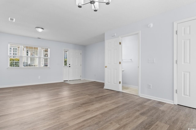 interior space with light hardwood / wood-style flooring