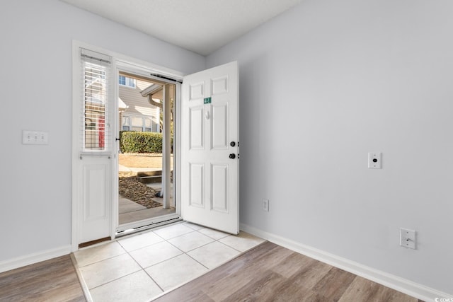 entrance foyer with light wood-type flooring