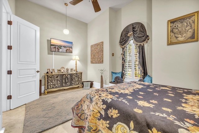 tiled bedroom featuring access to outside and ceiling fan