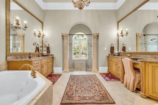 bathroom featuring ornate columns, crown molding, independent shower and bath, and vanity