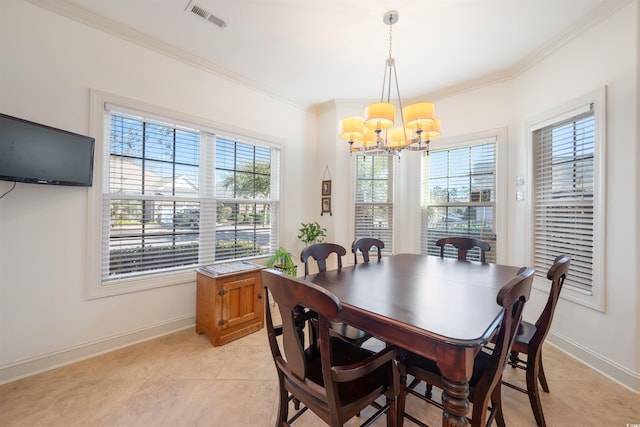 dining space with light tile patterned floors, a notable chandelier, ornamental molding, and visible vents