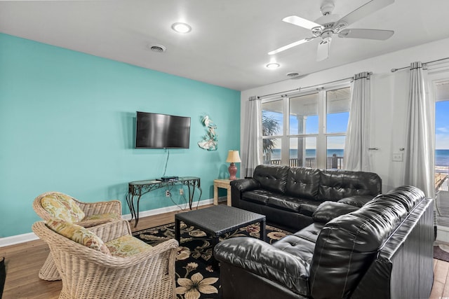 2022 N Waccamaw Dr, Garden City Beach, SC 29576 - living room with baseboards, wood finished floors, ceiling fan, and recessed lighting