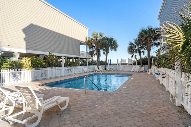 2022 N Waccamaw Dr, Garden City Beach, SC 29576 - community pool featuring fence and a patio